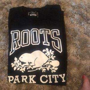 Roots black t-shirt.  Short sleeved size M